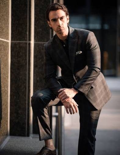 Man wearing a tailored dark wool blazer